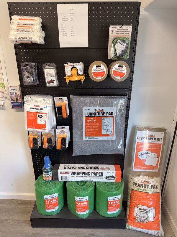 U-Haul moving supplies available at Mountain Storage including furniture pads, wrapping paper, and dish saver kits